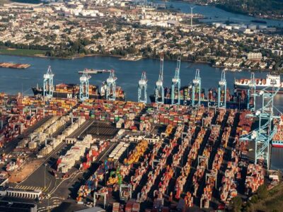 Port of Newark, Newark, New Jersey, USA - September 27, 2022 - Aerial view of Shipping Containers, Newark Bay, Panamax cranes, and the Port of Newark - Elizabeth Marine Terminal